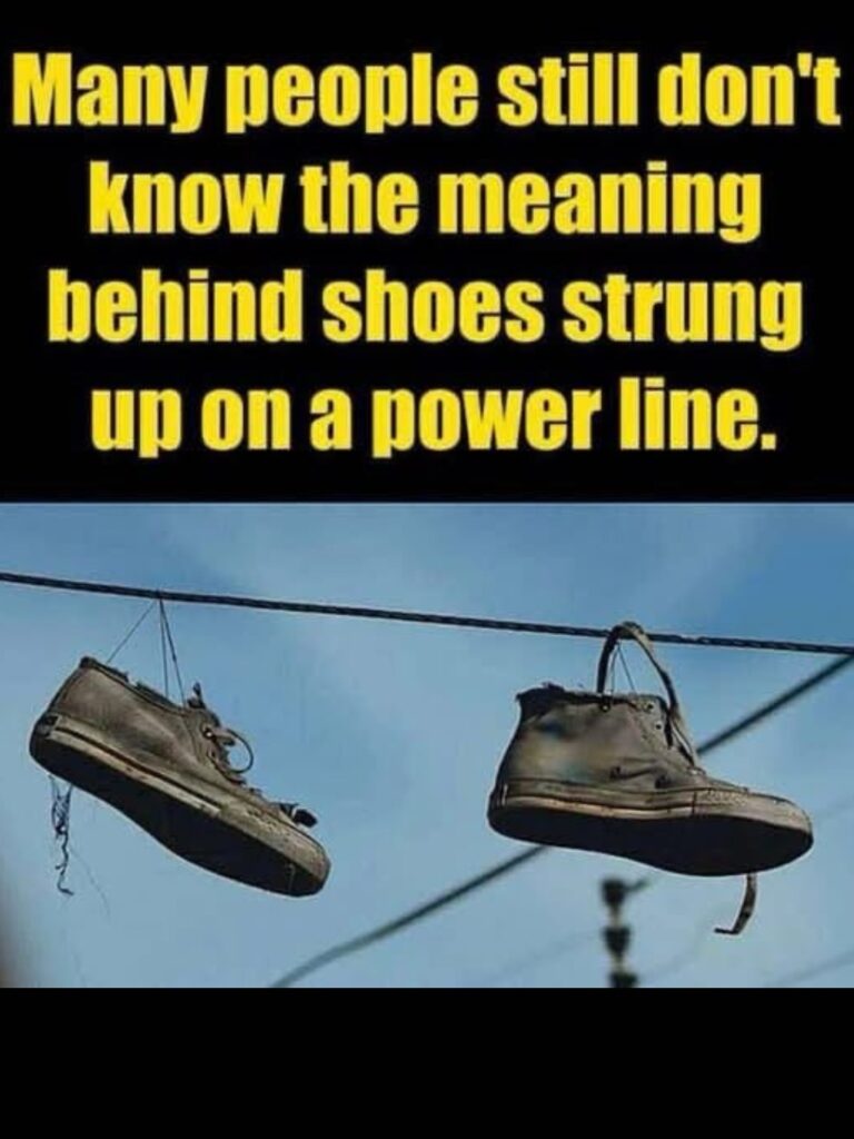The Meaning Behind Shoes Strung Up on a Power Line — What This Mysterious Tradition Really Means